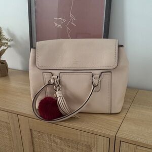 Kate Spade NY Cream Leather Shoulder Bag with Tassel and Pom Pom